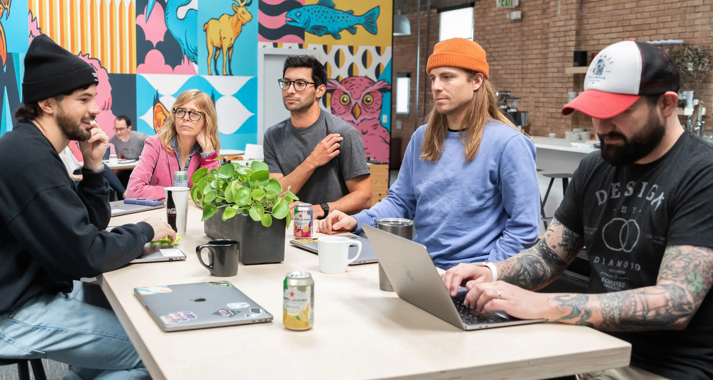 Image of team working in a creative space.